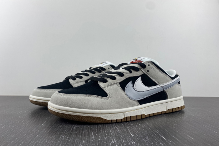 NIKE DUNK LOW “STENCIL SWOOSH”  DO9457-100